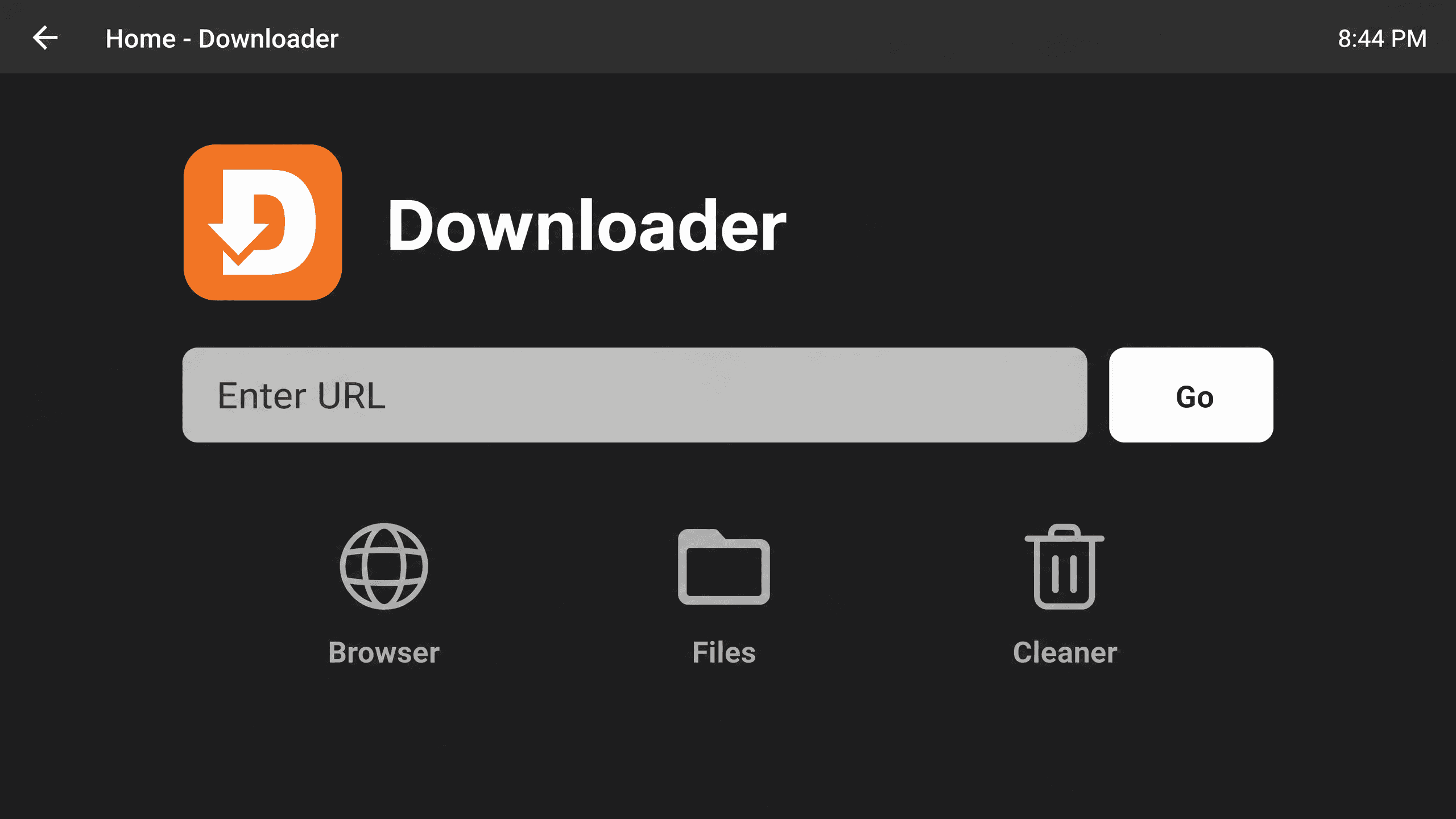 Downloader app home screen with the Enter URL field and Go button